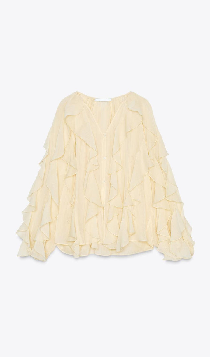 BLUSA CON VOLANTES