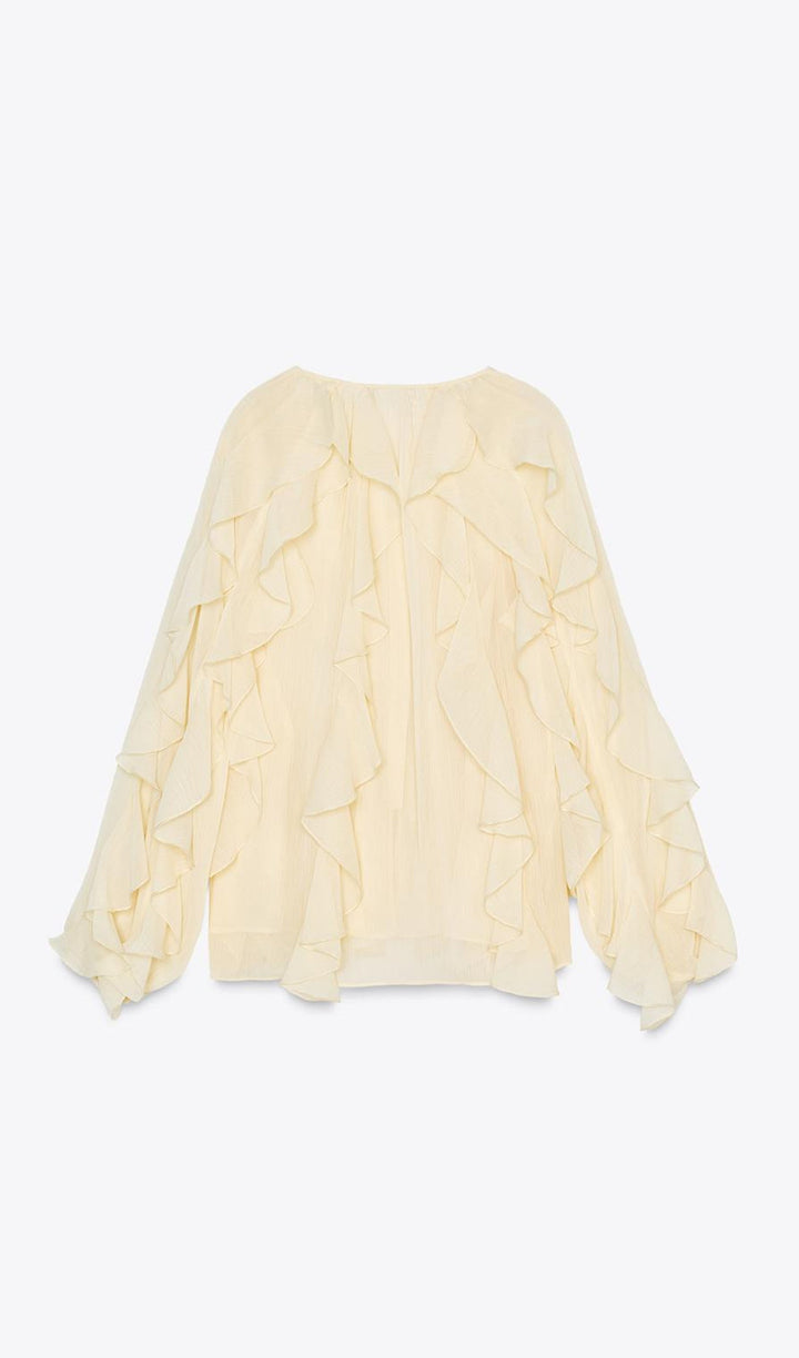 BLUSA CON VOLANTES