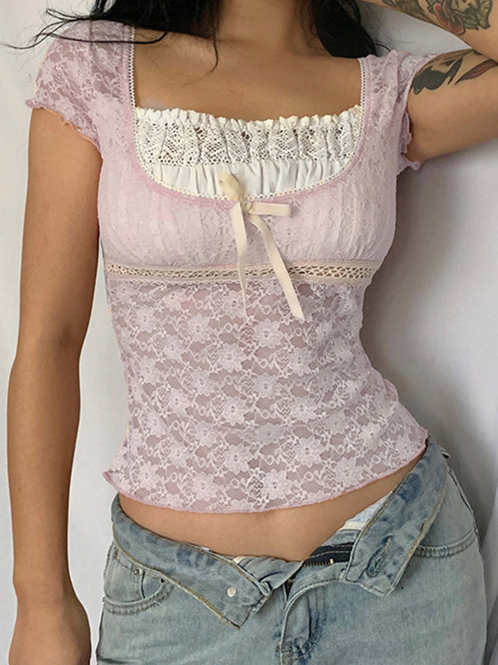 TOP CORTO CON RIBETE ROSA